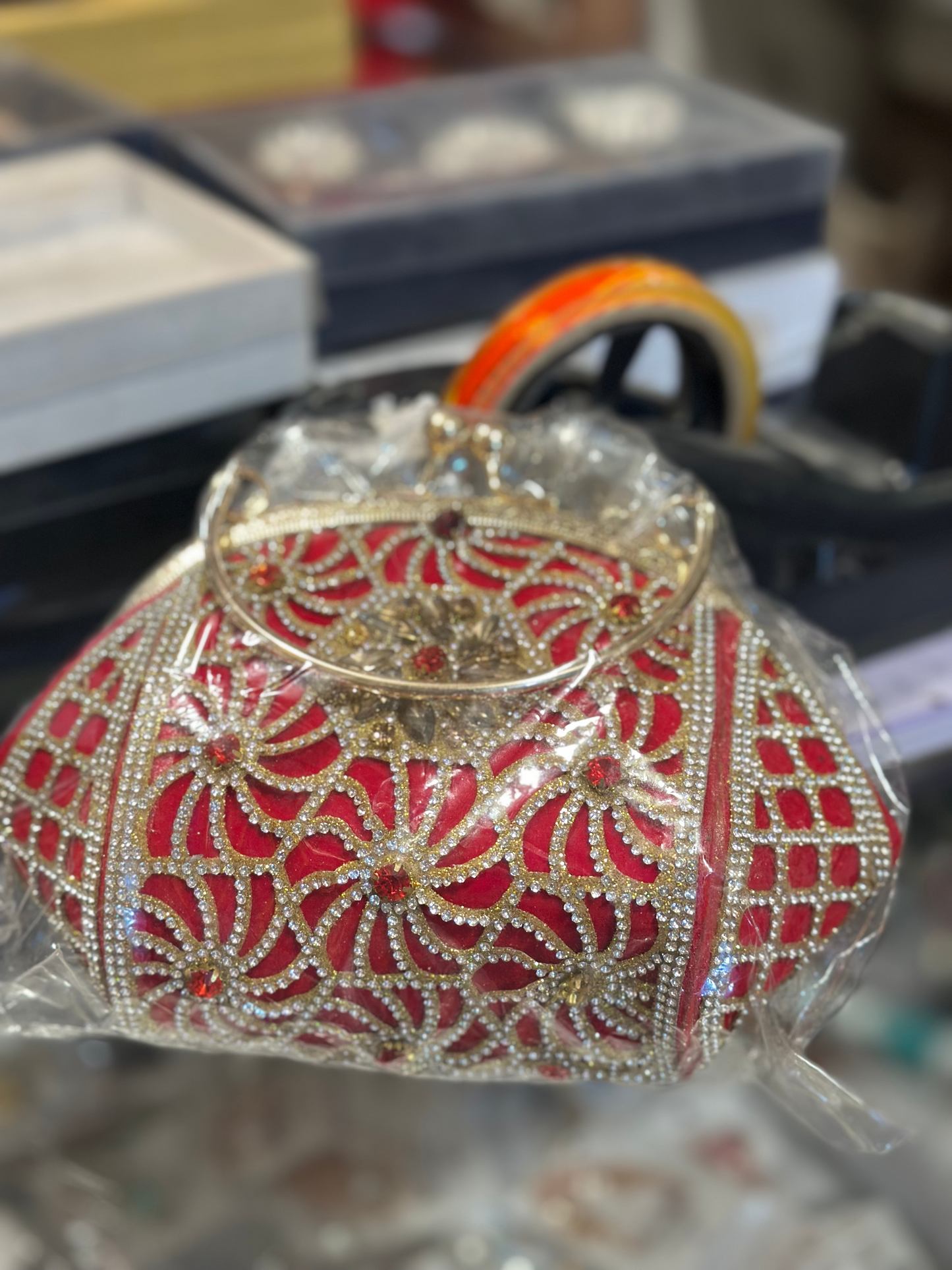 Luxury Red Bridal Clutch with Golden Stone Work | Handcrafted Party & Wedding Potli Bag for Women